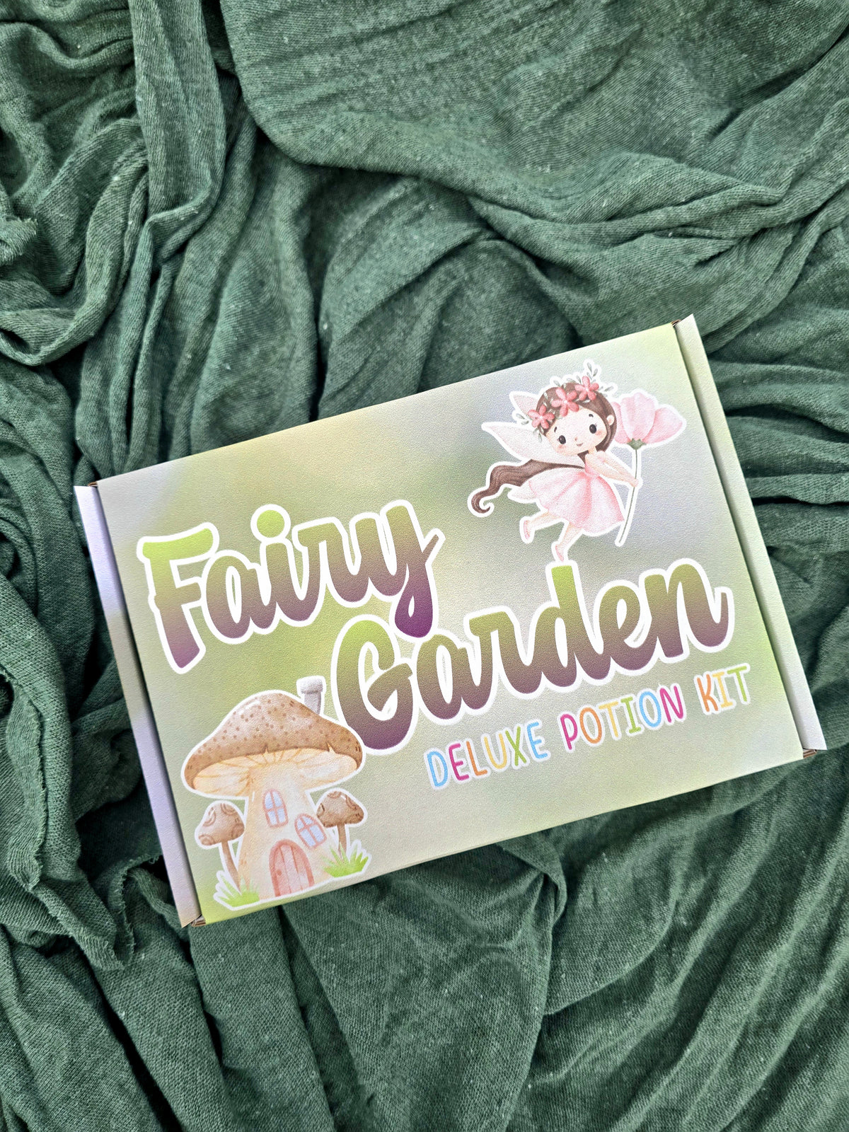 Fairy garden deluxe potion kit box on green fabric